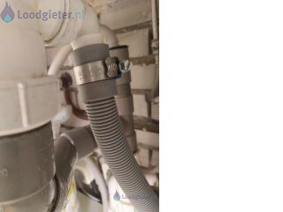 Loodgieter Installatie wasmachine Water loopt terug in wasmachine
