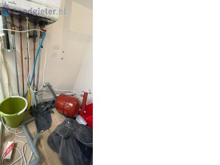 Loodgieter Expansievat Expansievat is losgekomen van de muur
